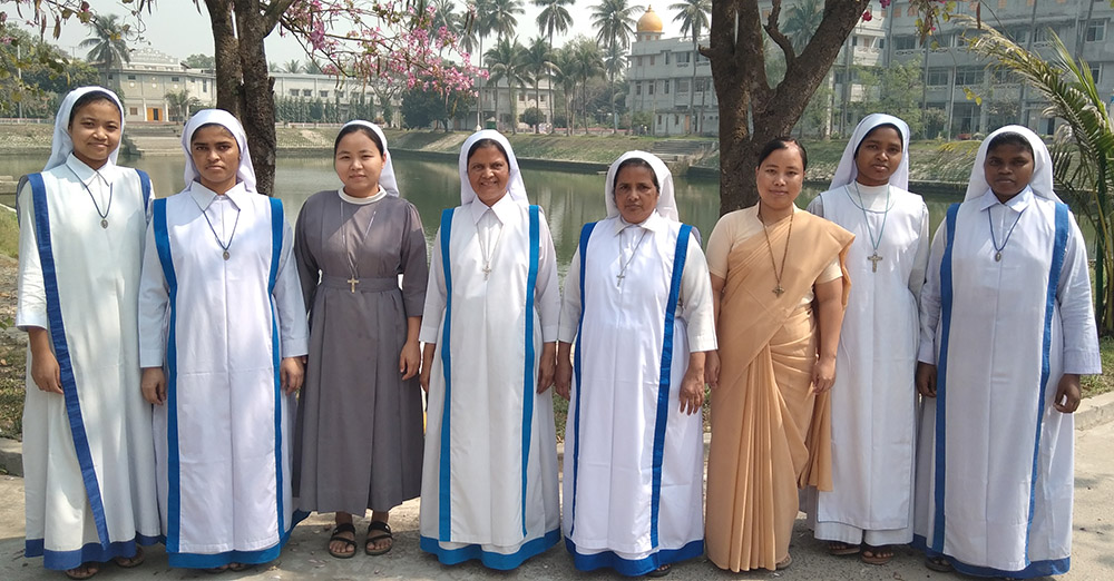Nuns pose for a photo at Kumudini Nursing College. Fourteen nuns stay at the college: Two are staff members and 12 students. (Sumon Corraya)
