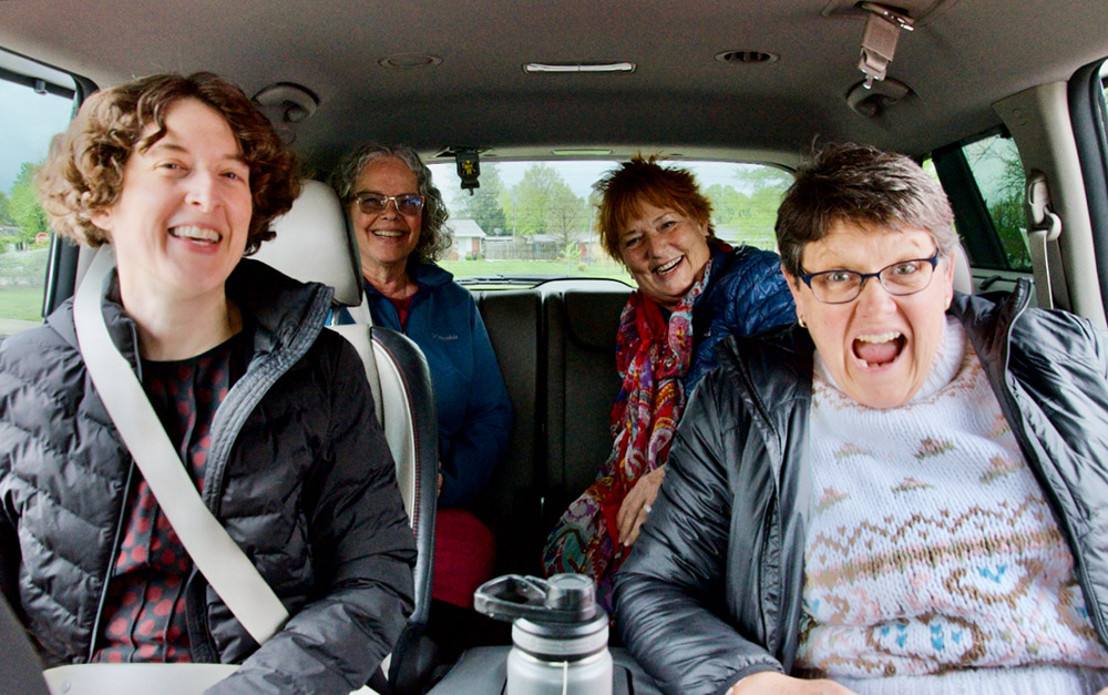 Women Touched by Grace participants, from left, the Rev. Julie Webb, the Rev. Diana Thompson, the Rev. Sarah Hollar and the Rev. Tamara Franks leave for a field trip April 28 to the Indiana Historical Society in Indianapolis. (GSR photo/Dan Stockman)