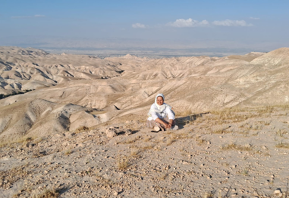 Cecilia Sierra praying in the Judean desert near Mount Musa (Courtesy of Cecilia Sierra)