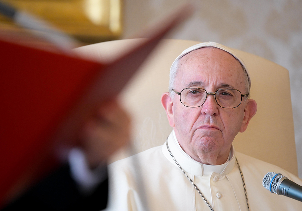 Pope Francis leads his general audience in the library of the Apostolic Palace Nov. 11, 2020, at the Vatican. A day after the Vatican released its extensive report on former Cardinal Theodore McCarrick, the pope renewed the Catholic Church's pledge to uproot the scourge of sexual abuse. (CNS/Vatican Media)