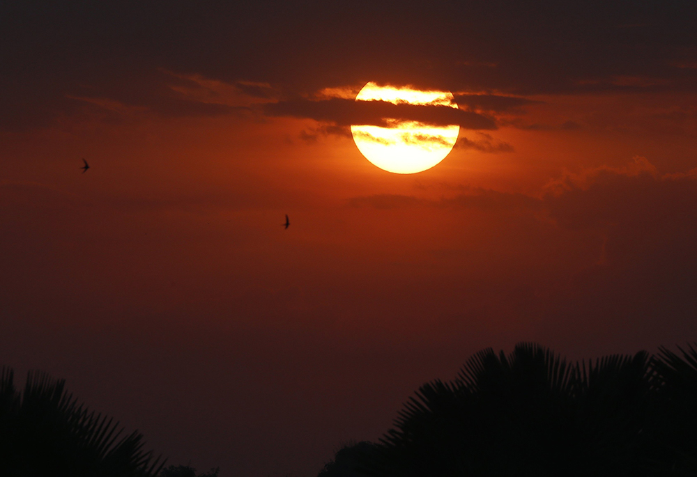 The sun rises Feb. 5 in Juba, South Sudan. (CNS/Paul Haring)