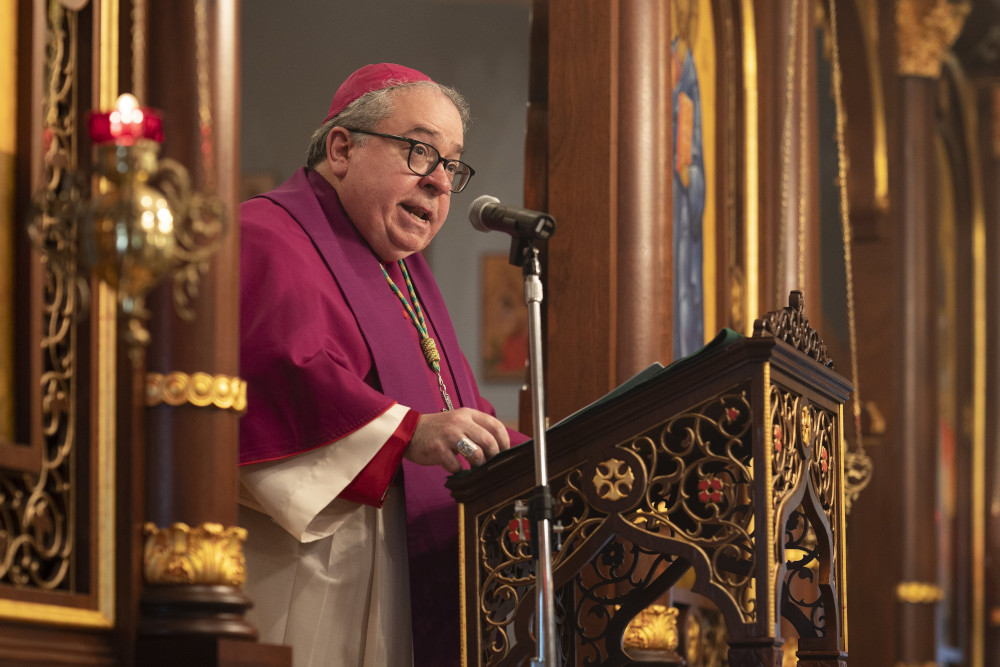 Bishop Michael Olson of Fort Worth, Texas, delivers remarks at St. Sophia Ukrainian Catholic Church in The Colony, Texas, March 6, 2022, during a prayer service for peace in Ukraine. (CNS photo/Juan Guajardo, North Texas Catholic)