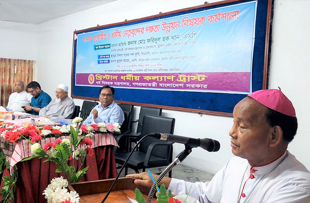 Bishop Ponen Paul Kubi, right, addresses the interreligious dialogue workshop held at Caritas Mymensingh Regional Office in Mymensingh, Bangladesh, May 20. (Courtesy of Nirmol Rozario)
