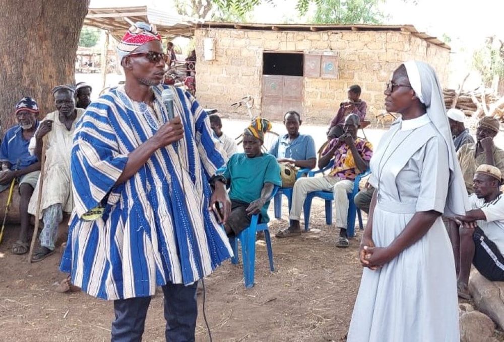 A sister participates in a community engagement session run by the Africa Faith and Justice/Ghana Network. The program aims to educate people about the harms of early or child marriage and find ways to end this longstanding tradition. (Courtesy of Eucharia Madueke)