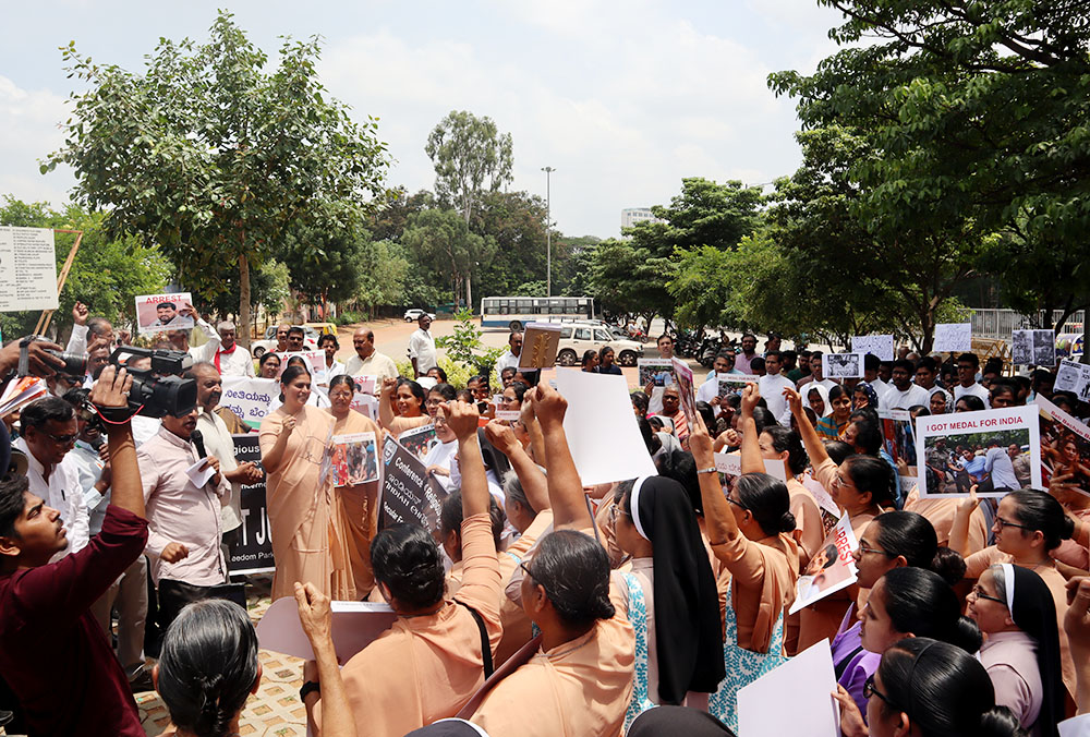 Apostolic Carmel Sr. Maria Nirmalini, who heads the Conference of Religious in India, addresses a June 4 protest rally in Bengaluru to condemn government apathy to women wrestler's demands and to violence in Manipur state. (Courtesy of Sister Clarice Maria)