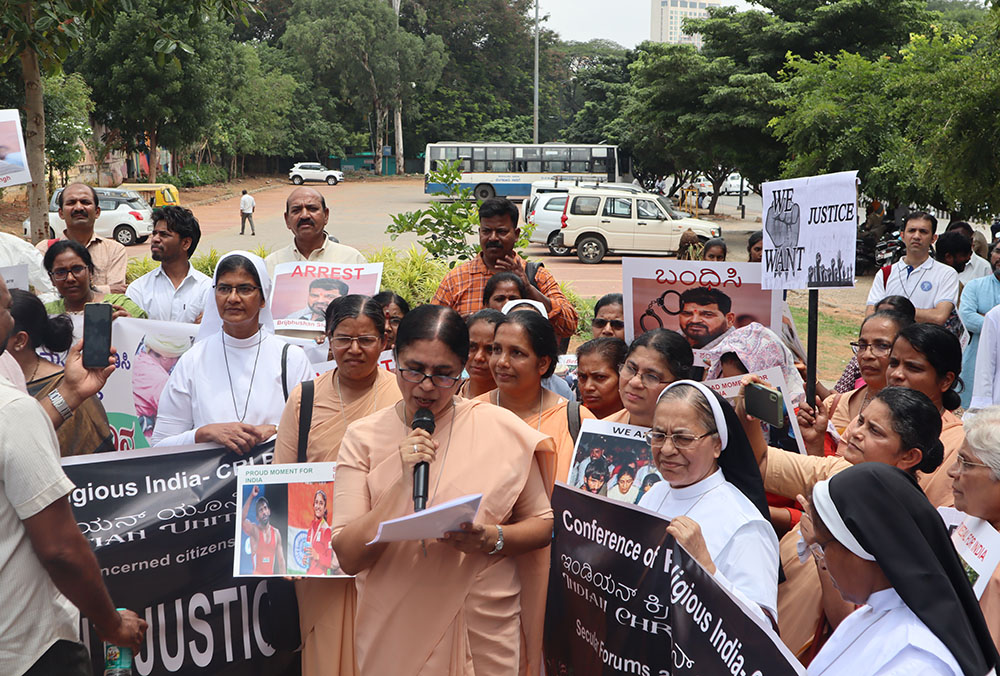 Apostolic Carmel Sr. Maria Nirmalini reads out a statement on June 4 in Bengaluru, India, pledging support to women wrestlers who are striking against workplace sexual harassment. (Courtesy of Sister Clarice Maria)
