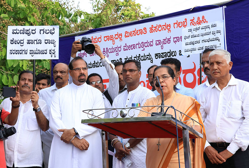 Bethany Sr. Cicilia Mendonca addresses the rally in Mangalore, India, on June 6, asking the government to protect Christians and the religious serving in Manipur state. (Courtesy of Canera Communications/Fr. Anil Ivan Fernandes)