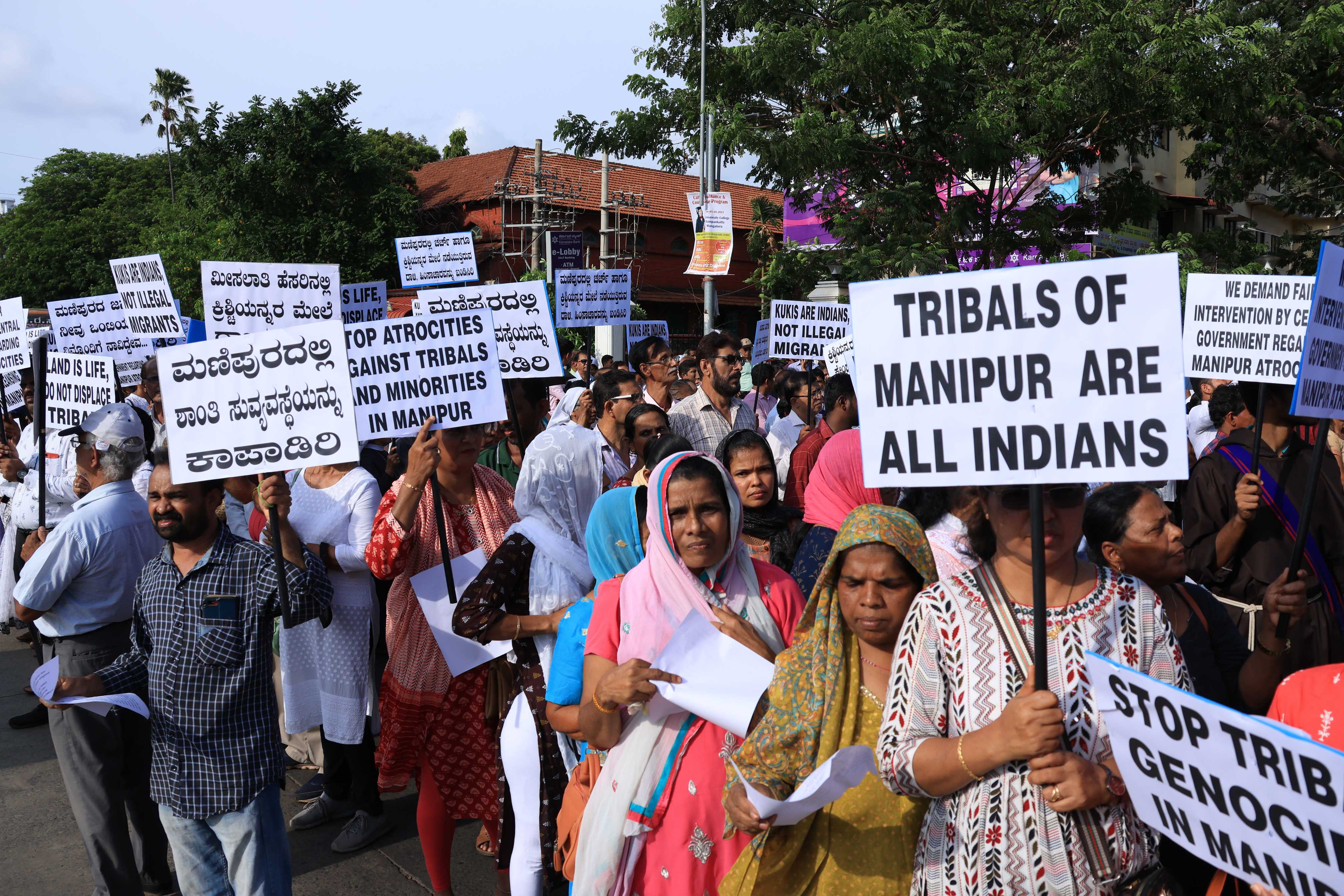 During the June 6 protest rally in Mangalore, India, protesters carry placards pledging solidarity with Christians in Manipur state. (Courtesy of Canera Communications/Fr. Anil Ivan Fernandes)