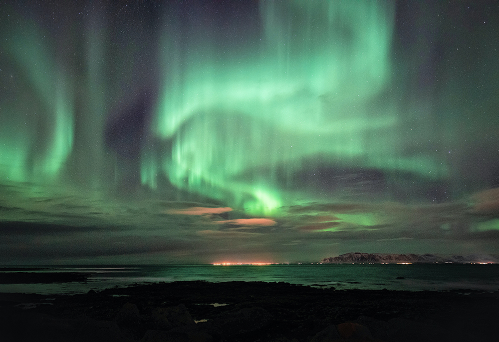 An aurora borealis is seen in a photo taken in Reykjavik, Iceland. The Spirit of Humanity Forum was held June 1-3 in Reykjavik. (Unsplash/Neil Mark Thomas)