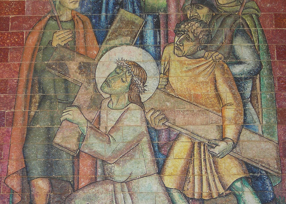 Simon of Cyrene helps Jesus carry the cross in a detail from the Fifth Station of the Cross at the Sanctuary of Our Lady of Fátima in Portugal. (Wikimedia Commons/Therese C)