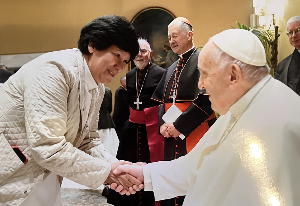 Sr. María Elena Méndez Ochoa of the Guadalupan Missionaries of the Holy Spirit greets Pope Francis in Rome in a private audience for a group of Latin American sisters and a Catholic Extension team April 26. (Courtesy of María Elena Méndez Ochoa from the printed photo taken by the Vatican)