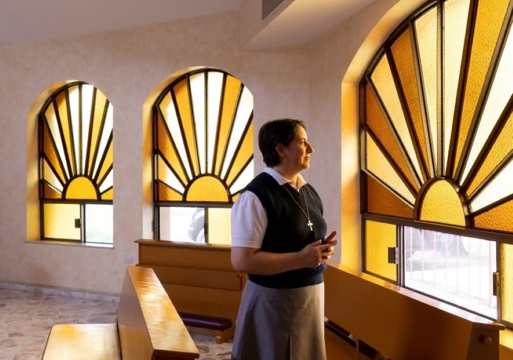Salesian Sr. Ana Cristina Chavira Sáenz, director of Comunidad Sagrada Familia (Holy Family Community), stands in the convent's chapel in Monterrey, Mexico. Holy Family Community helps children of immigrants maintain their studies while adapting to life in Mexico. (GSR photo/Nuri Vallbona)