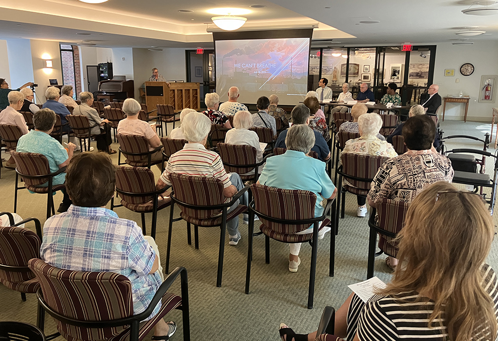 IHM Sr. Barbara Stanbridge addresses an audience of about 45 religious women and local community members at "We Can't Breathe," held July 25 at the IHM motherhouse in Monroe, Michigan. (Amy Ketner)