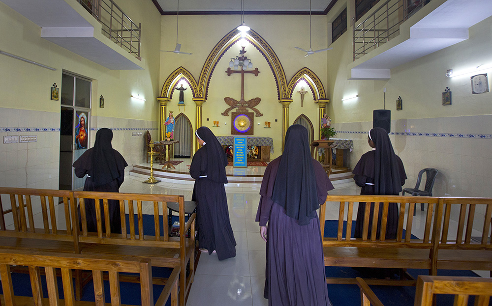 In November 2018, nuns who have supported the accusation of rape against Bishop Franco Mulakkal leave after offering prayers at a chapel in St. Francis Mission Home, in Kuravilangad in southern Indian state of Kerala. (AP/Manish Swarup)