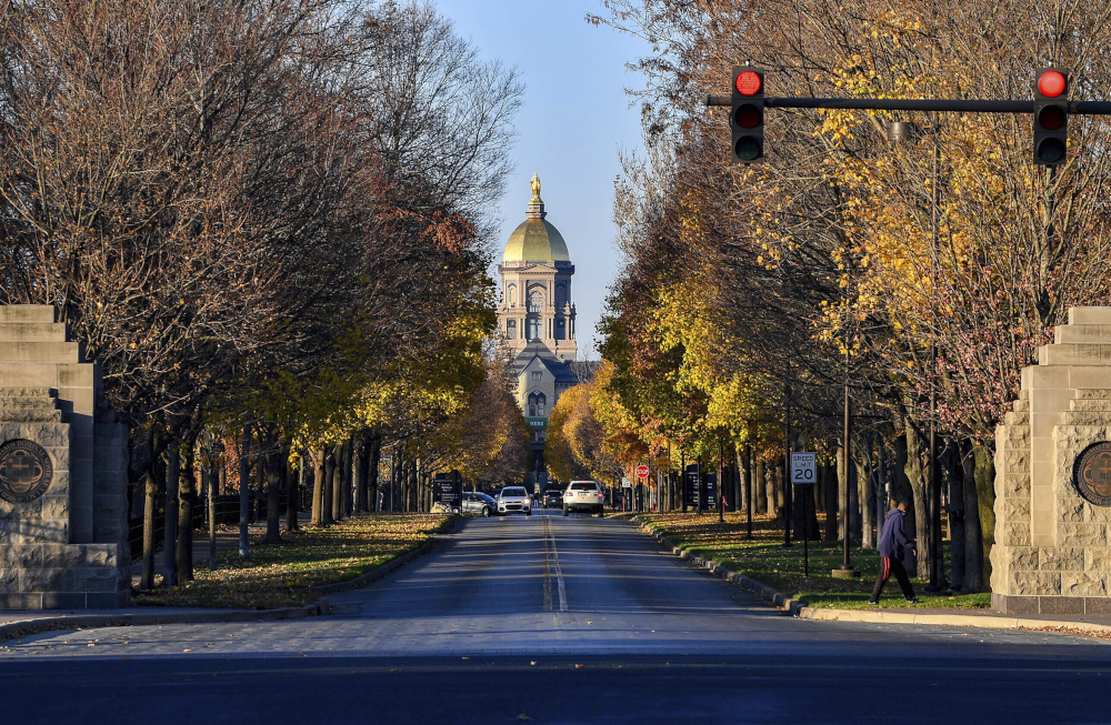 The dome is seen from the entrance to the campus of the University of Notre Dame, Saturday, Nov. 7, 2020, in South Bend, Ind. (Matt Cashore/Pool Photo via AP)