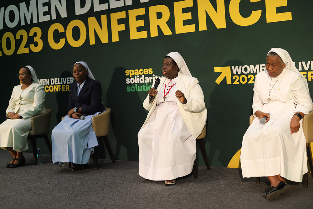 Sacred Heart of Jesus Sr. Rosemary Nyirumbe (second from right) speaks on a panel during a July 18 side event hosted by the Women in Faith Leadership and sponsored by Conrad N. Hilton Foundation at the Women Deliver 2023 Conference in Kigali, Rwanda. The panel also included, from far left: Srs. Jane Wakahiu of the Little Sisters of St. Francis; Hedwig Muse of the Little SIsters of Mary Immaculate of Gulu, Uganda; and Francisca Ngozi Uti of the Handmaids of the Holy Child Jesus. (GSR photo/Doreen Ajiambo)