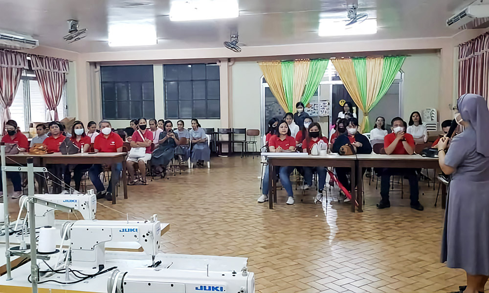 Claretian Missionary Sisters meet with representatives of the enterprise that donates sewing machines to the congregation's beneficiaries. (GSR photo/Oliver Samson)