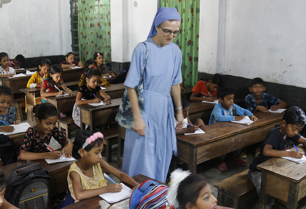 Sr. Ombretta Neri, of the Contemplative Missionary Movement of Charles De Foucauld, visits St. Mary's Infant School ‍in the Rupsha area of Bangladesh and talks to the students. (Stephan Uttom Rozario) 