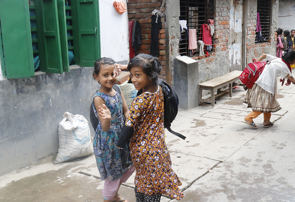 After finishing class, students of St. Mary's Infant School are going home happy. (Stephan Uttom Rozario)