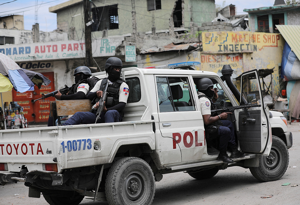 Police officers on patrol take part in an anti-gang operation amid gang violence March 3 in Port-au-Prince, Haiti. (OSV News/Reuters/Ralph Tedy Erol)