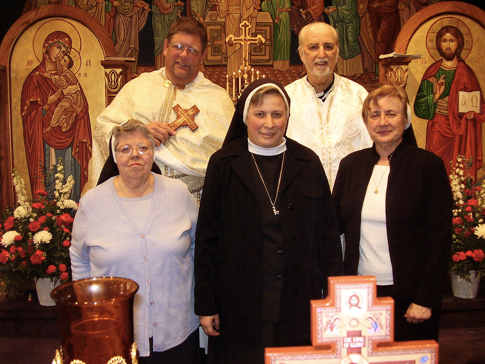 Basilian Srs. Olga Marie Faryna, Monica Jaciuk and Ann Laszok (front row from left), with Frs. Michael Polosky and Walter Wysochansky (back row from left), pose for a photo after a farewell Divine Liturgy in Ambridge, Pennsylvania, to wish Sister Monica well on her return to Argentina. (Courtesy of Ann Laszok)
