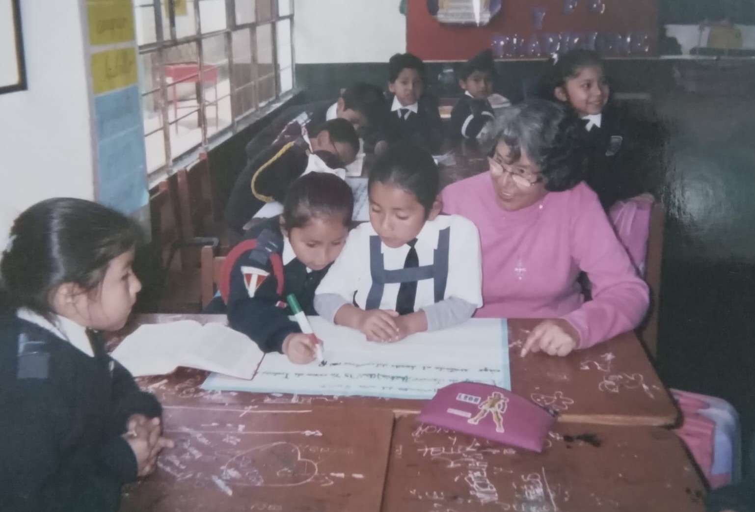 Franciscan Sr. Cristina Florez Gonzalez, right, works with children of Peruvian Air Force members in the Surco District of Lima, Peru, May 8, 2005. (Photo courtesy of Cristina Florez Gonzalez)