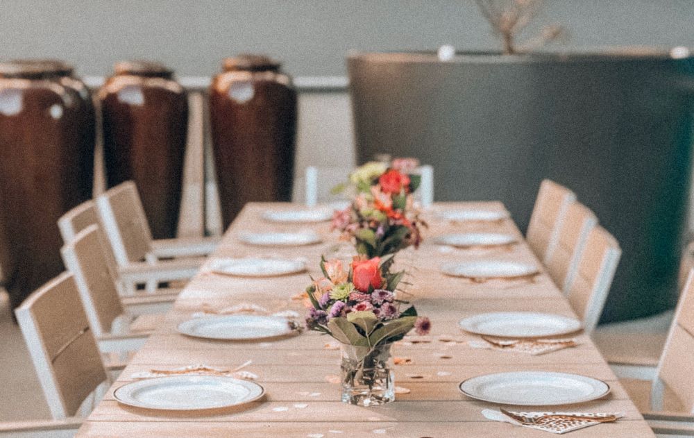 Table set with white plates