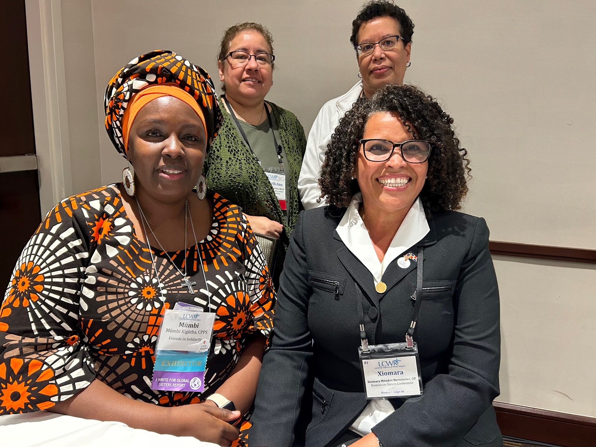 Panelists for the afternoon session on intercultural leadership: seated, Precious Blood Sr. Mumbi Kigutha and Dominican Sr. Xiomara Méndez-Hernández; standing, Missionary Catechist of Divine Providence Sr. Elizabeth Ann Guerrero and Mercy Sr. Ivette Diaz (Courtesy of Annmarie Sanders)
