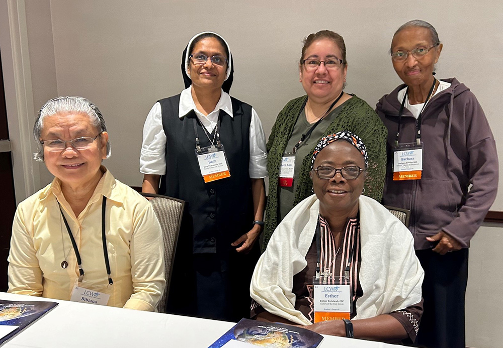 Panelists for the morning session on intercultural leadership at the 2023 Leadership Conference of Women Religious assembly in Dallas: seated, Dominican Sr. Bibiana Colasito and Holy Cross Sr. Esther Adjoa Entsiwah; standing, Franciscan Sr. Jincy Vilayappilly, Missionary Catechist of Divine Providence Sr. Elizabeth Ann Guerrero (facilitator), and Good Shepherd Sr. Barbara Beasley (Courtesy of Annmarie Sanders)