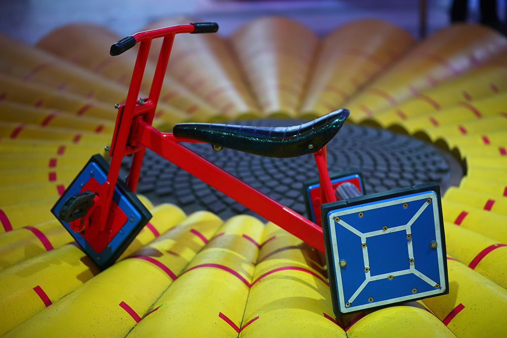 Tricycle with square wheels (Dreamstime/Oleksii Spesyvtsev)