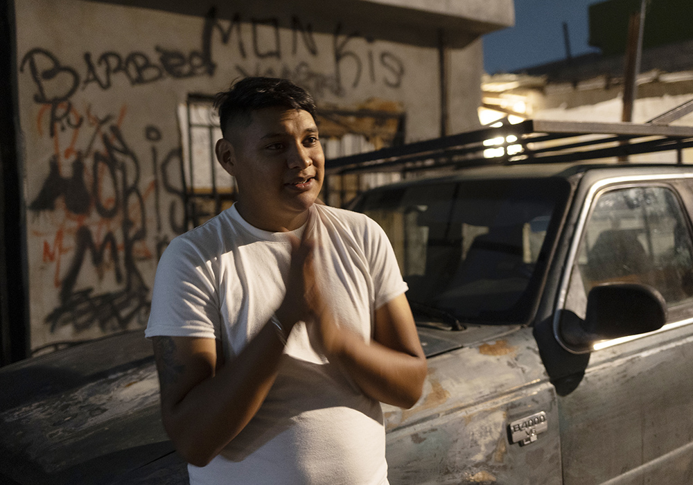 Los Monckis member Fernando Barrientos talks about what Sr. Sandra López García and her team mean to him during one of their weekly visits to the youth gang's hangout in Monterrey, Mexico. "They inspire me; they motivate me," he said of the sisters. "They make me turn the page." (Nuri Vallbona)