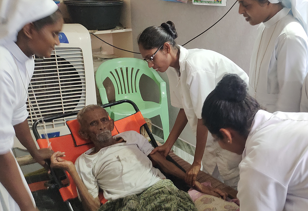 The nursing students and nuns during their community nursing services in villages attending to a patient at his home in the southeastern Indian state of Andhra Pradesh (GSR photo/Thomas Scaria)