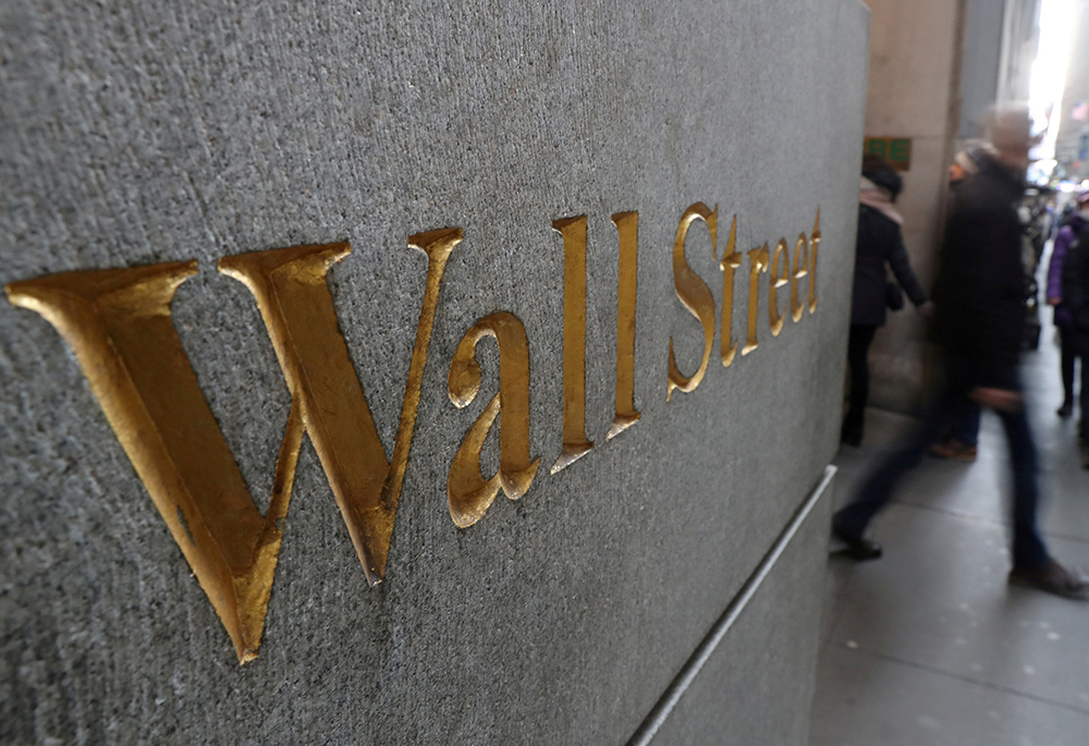 "Wall Street" is marked on a building outside the New York Stock Exchange in New York in this Jan. 3, 2019, file photo. (CNS/Reuters/Shannon Stapleton)