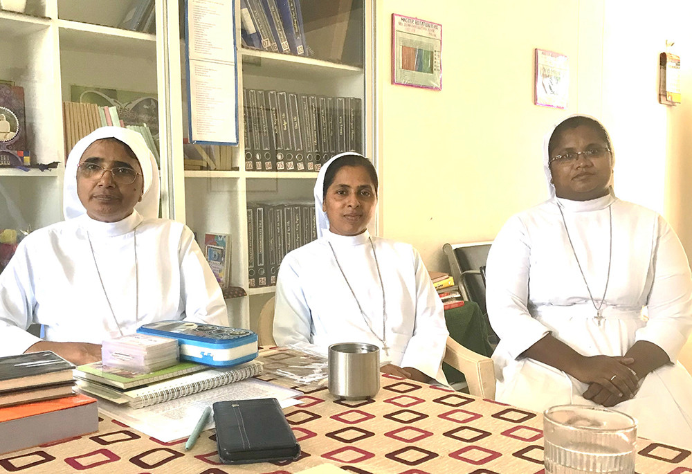 Society of St. Anne Phirangipuram Sr. Ignatius Suman with her two colleagues, Sr. Srujana Maria, center, and Sr. Balajyothi Ramisetti, right, in Suman's office in Sree Jeevan Jyothi Vocational Junior College. (GSR photo/Thomas Scaria)