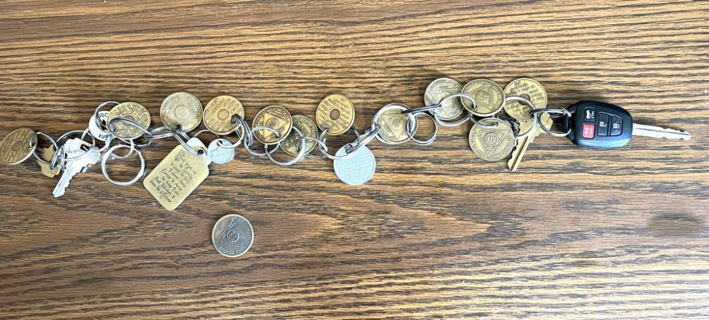 Franciscan Sr. M. Keith Marcinak's keychain holds the Alcoholic Anonymous medallions that celebrate her 47 years of sobriety. (Courtesy of M. Keith Marcinak)