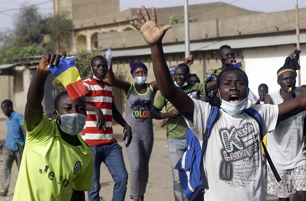 People protest in N'Djamena, Chad, on April 27, 2021, after Mahamat Idriss Déby declared himself the head of the country's Transitional Military Council. (AP/Sunday Alamba)