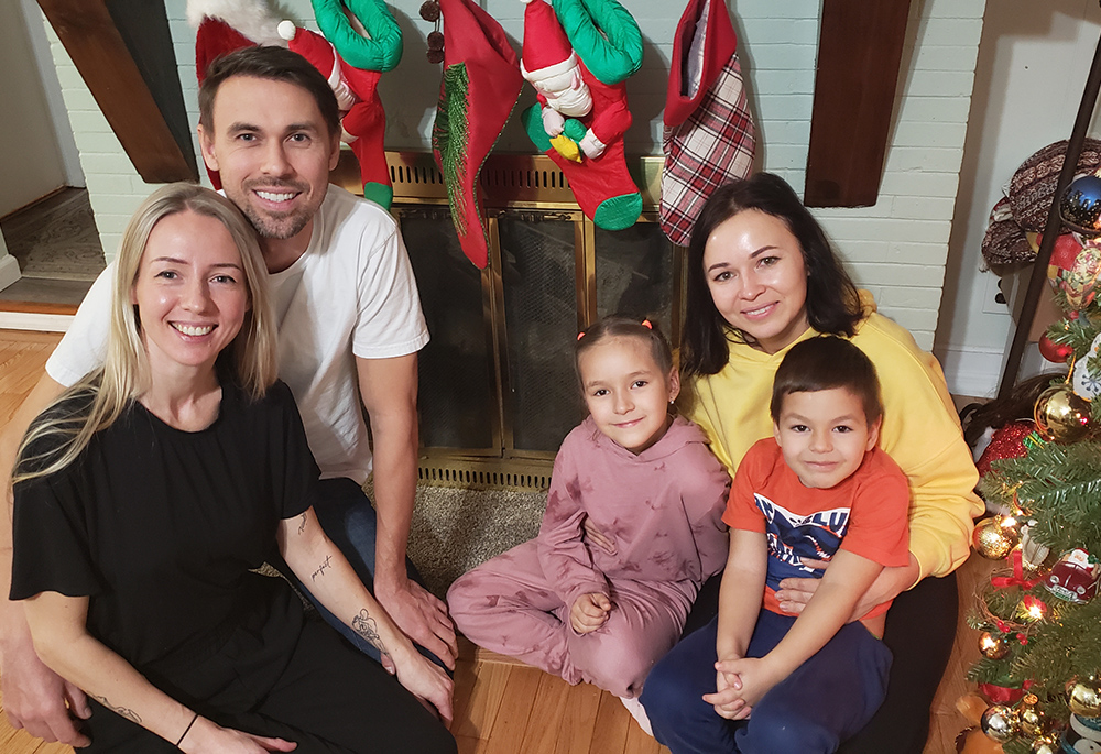 Recent Ukrainian refugees in January this year at a residence on the campus of the Sisters of St. Joseph of Brentwood, New York. On the left, Kseniia (Kate) Kasieieva and her husband, Oleksandr (Alex) Somin, On the right, Anna Konovalova and her two children, son Herman and daughter Diana. Later in the year, in June, Anna and the children were reunited with their father, Igor. (GSR photo/Chris Herlinger)