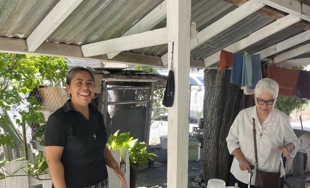 Sr. Josefina López Arredondo, superior of the community, is seen with Sr. María de la Luz González Díaz in the convent's garden of the Sisters of Our Lady of Charity of the Good Shepherd in Nuevo Laredo, Mexico. (GSR photo/Luis Donaldo González)