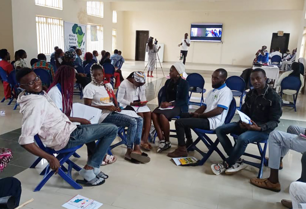 A group participates in a working session after an intensive advocacy training workshop sponsored by Africa Faith & Justice Network in Nigeria. (Courtesy of Bernadette Eyewan Okure)