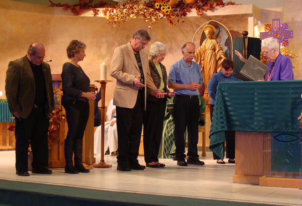 Sr. Patricia Crowley is pictured blessing Benedictine Oblates in Colorado. (Courtesy of Benedictine Sisters of Chicago)