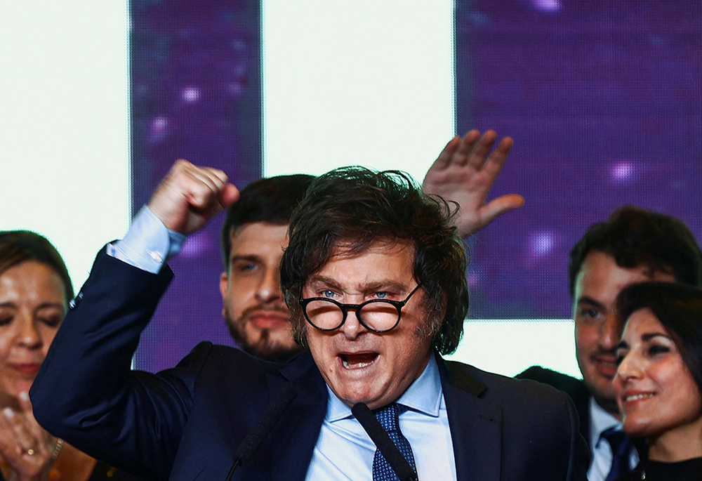 Argentine presidential candidate Javier Milei gestures to supporters as he reacts to the results of the presidential election Oct. 22 in Buenos Aires. The libertarian upstart claimed 30% of the vote, setting him up for a November runoff with Economy Minister Sergio Massa of the Peronist party, who won 36.7% of the vote. (OSV News/Reuters/Matias Baglietto)