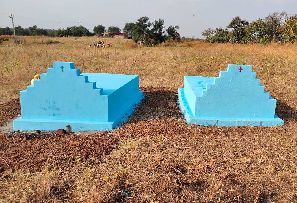 A cemetery located in the interior villages of India is pictured here, where a mother and a son who died a few years apart are buried side by side. (Tessy Jacob)
