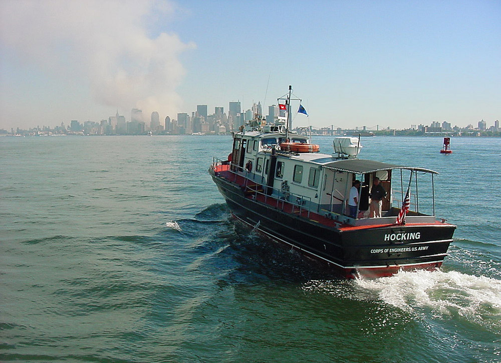 Patrol Boat Hocking heads toward Lower Manhattan on Sept. 11, 2001, to provide assistance following the attacks on the World Trade Center. The boat was one of many vessels that helped to ferry evacuees from Lower Manhattan and bring in emergency responders on return trips. (Wikimedia Commons/U.S. Army Corps of Engineers file photo)