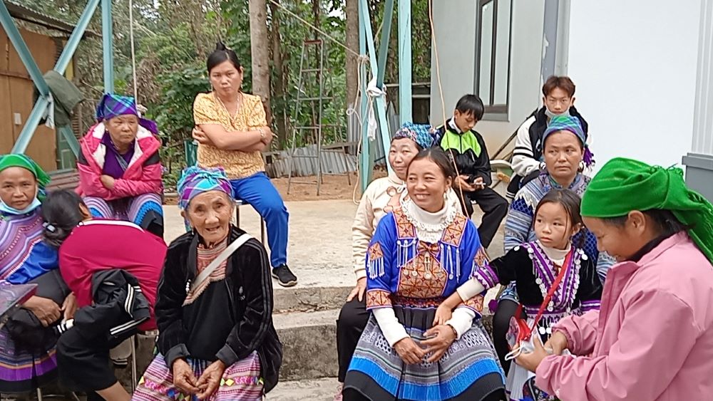 Hmong women in traditional clothes visit a nativity in Pho Lu Parish in Lao Cai province on Dec. 17. They are from Nam Xe village, 30 kilometers (19 miles) from the parish. (Joachim Pham)