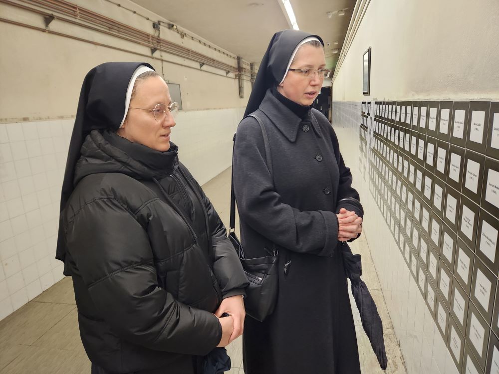 Two nuns pray at At a memorial site at the hospital in Vukovar, Croatia.