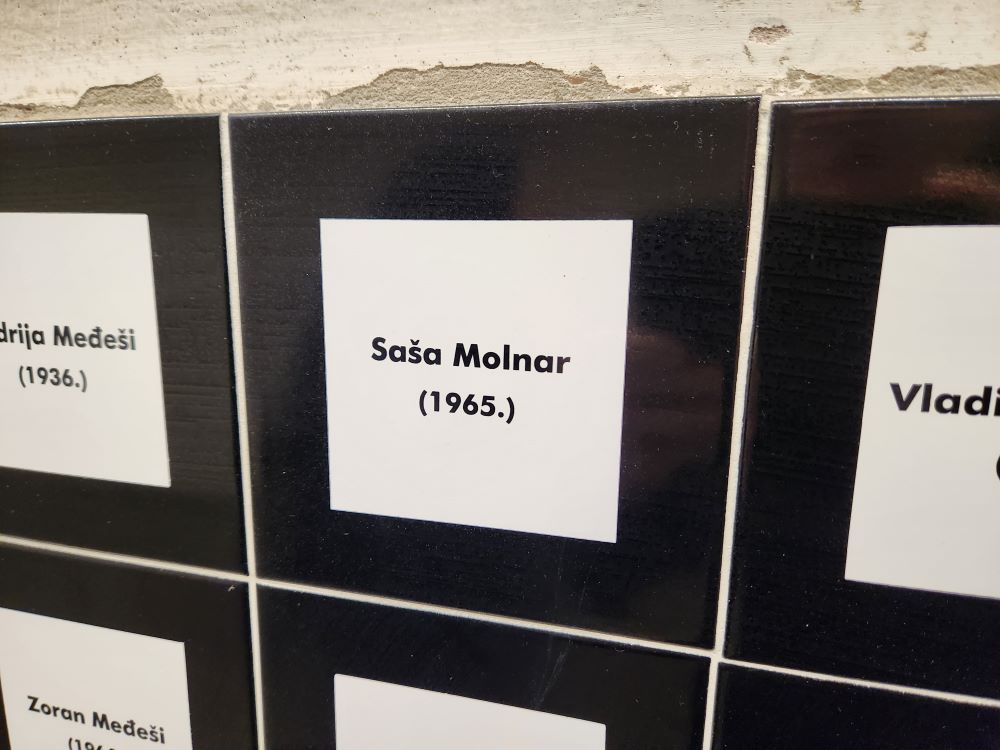 At a memorial site at the hospital in Vukovar, Croatia, a plaque commemorates Saša Molnar, the brother of Sr. Franciska Molnar, one of the victims of a 1991 massacre. (GSR Photo/Chris Herlinger)