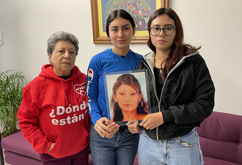 Sara Torres Carrizales, left, and her granddaughters, ages 17 and 18, attended CADHAC's press conference Nov. 26. They continue searching for her daughter Elia Monsiváis, who has been missing since 2010 after she was snatched from her home by a group of armed men. (Julieta Valdez)