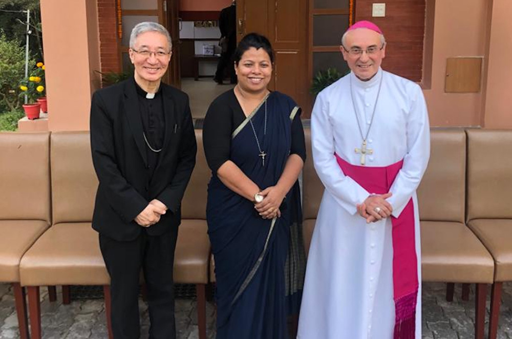 Cluny Sr. Durga Cecilia Shrestha (center) poses for a photograph with the Apostolic Vicar of Nepal Bishop Paul Simmick (right) and senior priest after she was appointed executive director of Caritas Nepal in June 2023. (Courtesy photo)