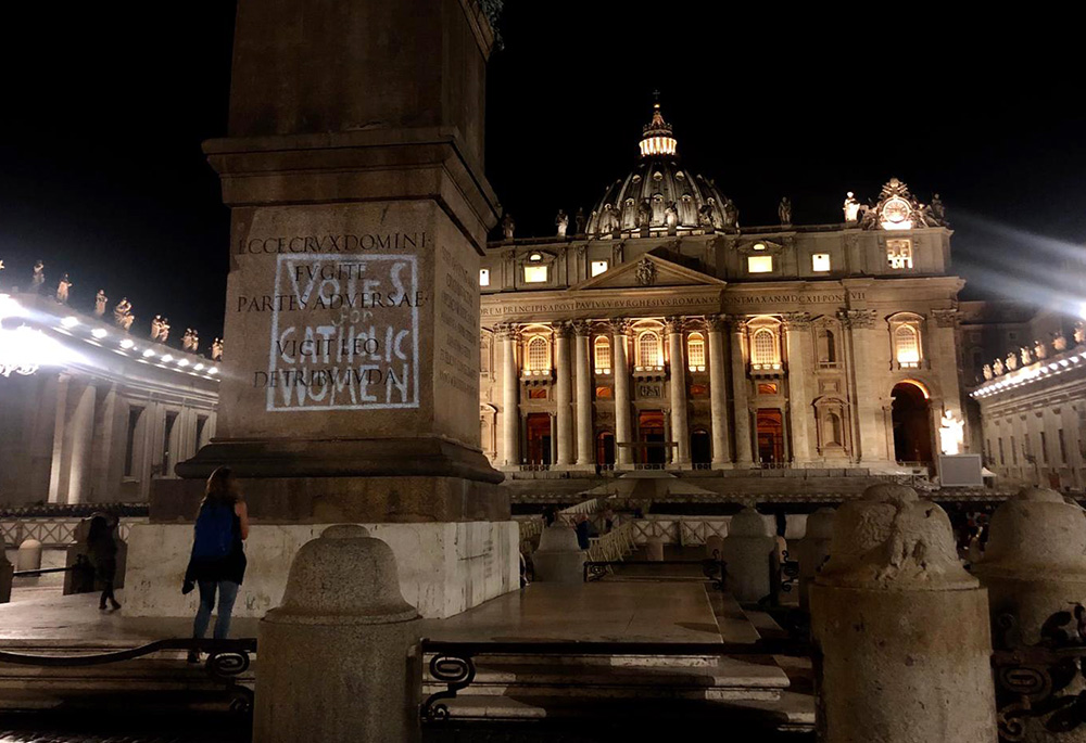 During the 2019 synod for the Amazon, Deborah Rose-Milavec helped project images of a "Votes for Catholic Women" sign around Vatican City. This past fall, women voted in a Synod of Bishops for the first time. (Courtesy of Deborah Rose-Milavec) 