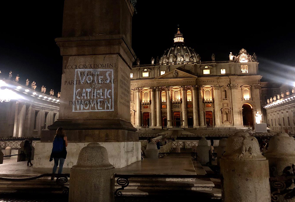 During the 2019 synod for the Amazon, Deborah Rose-Milavec helped project images of a "Votes for Catholic Women" sign around Vatican City. This past fall, women voted in a Synod of Bishops for the first time. (Courtesy of Deborah Rose-Milavec)